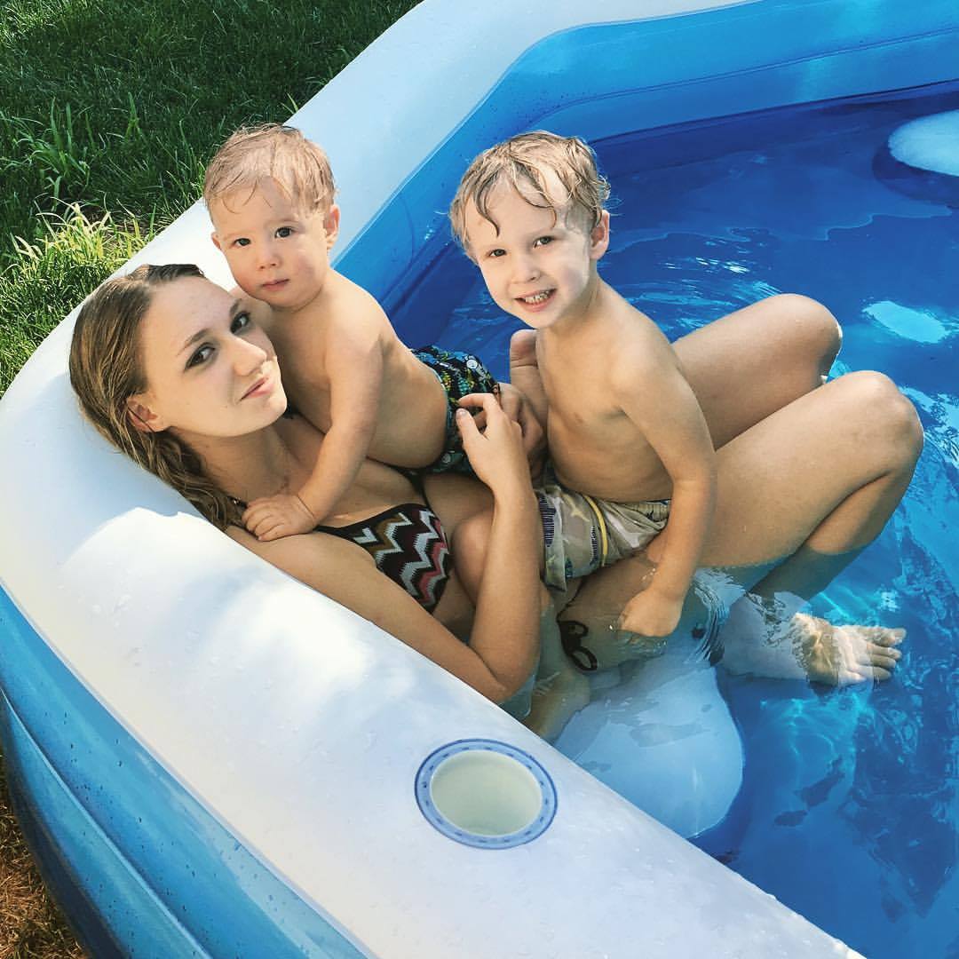French au pair, Gaelle, and her host children swimming.